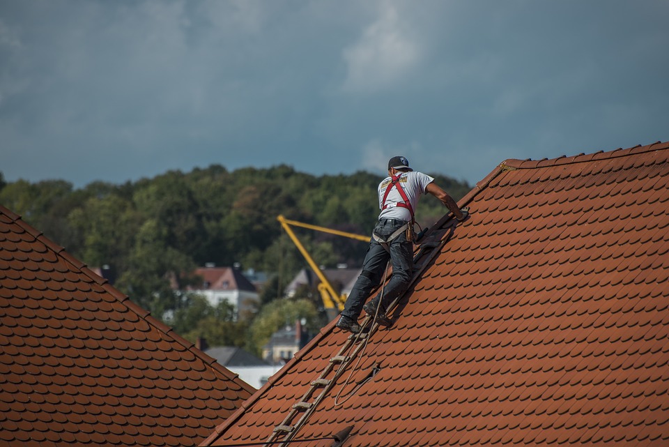 TC Roofing Pros crew at work on a roof installation