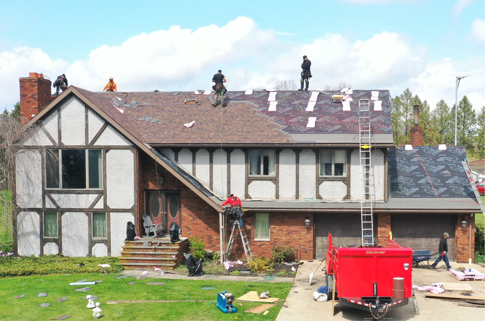 TC Roofing Pros crew re-roofing a residential home in Northeastern PA