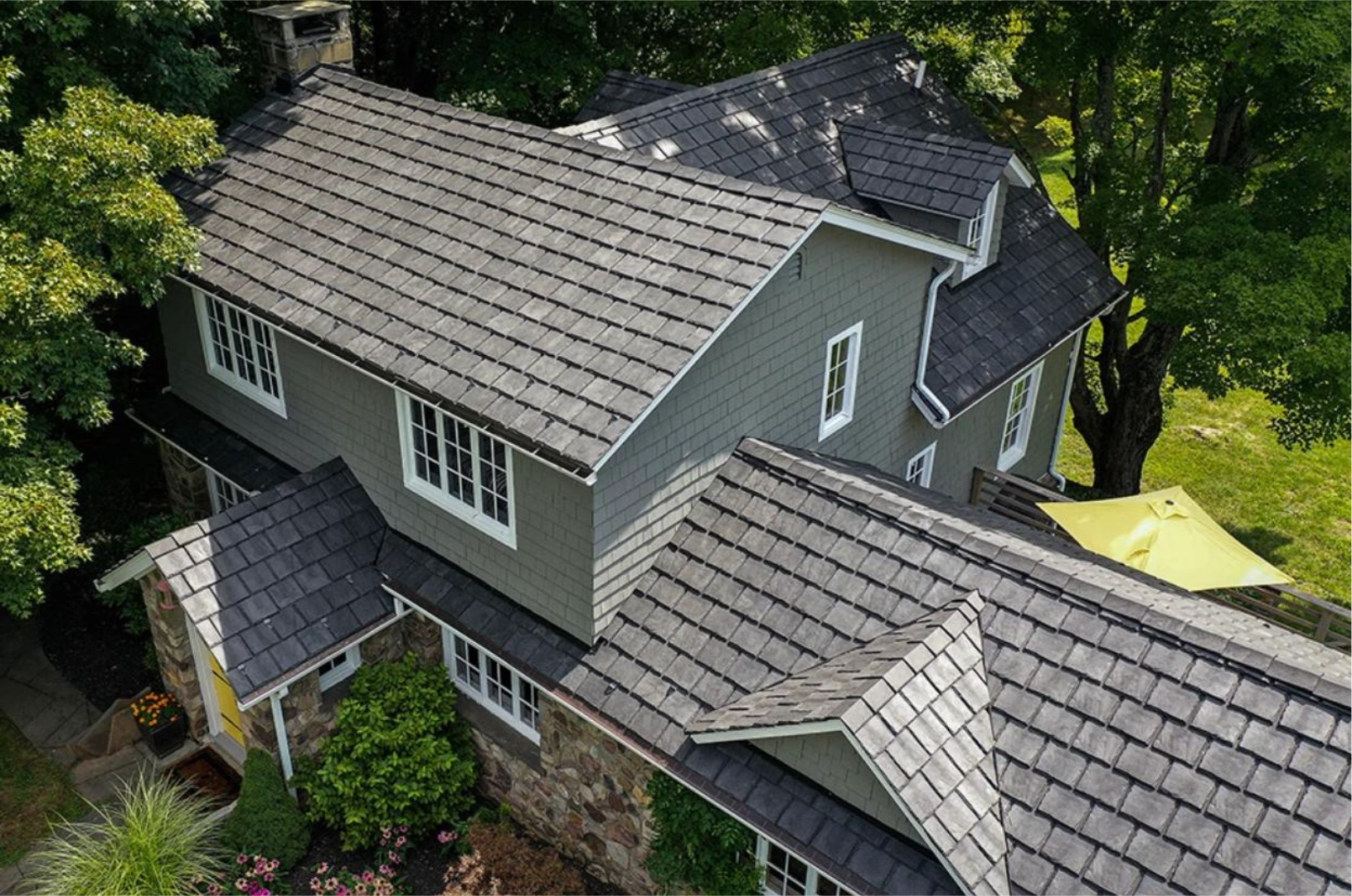 Designer slate roof installed on a stone home in Northeastern PA